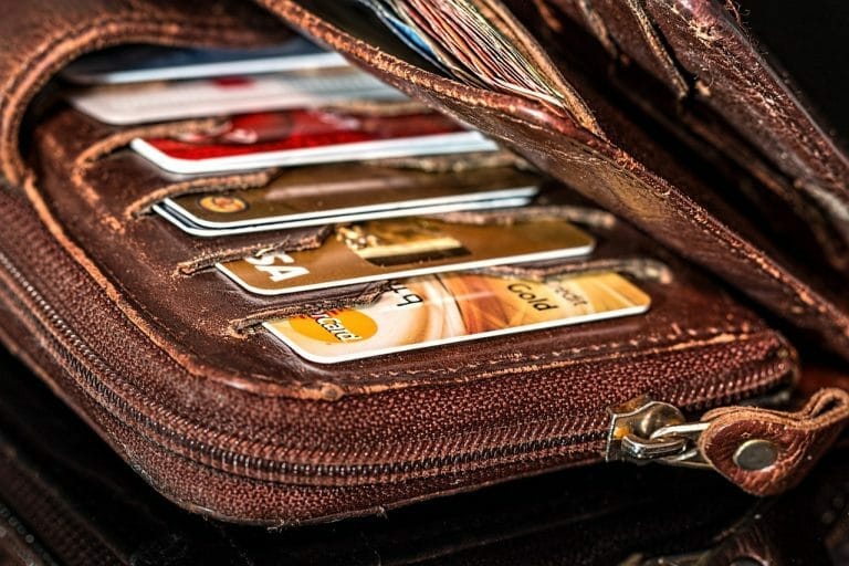 Five credit cards in a leather wallet