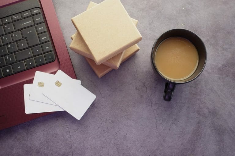 laptop, coffee and credit cards