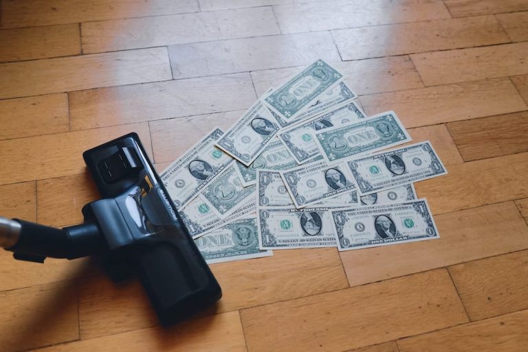 Vacuum cleaner and a stack of cash